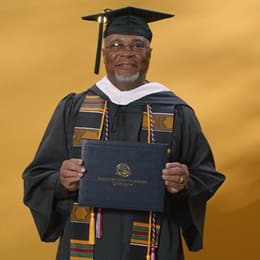 Dennis Peacock, a 2024 graduate who earned his bachelor's in graphic design and media arts.