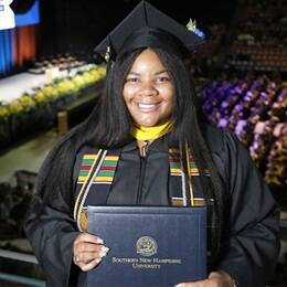 Nakia Woodard, a 2023 graduate who earned her bachelor's in business administration with a concentration in human resources management from SNHU.