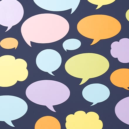A bunch of multi-colored speech bubbles representing personal growth quotes