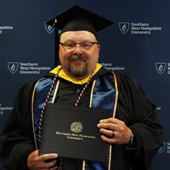 Allan Smithberg, a 2024 graduate from SNHU with a bachelor's in criminal justice and a concentration in corrections.