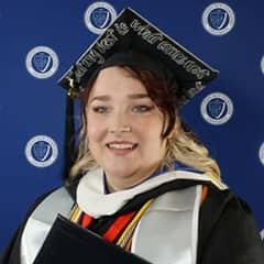 Analiece Clark, a 2023 graduate who earned her bachelor's in communication from SNHU.