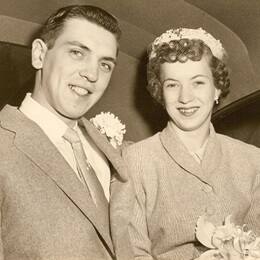 A young Annette Roberge, right, in the back of a car with her husband, left.