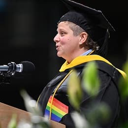 Alicia Carafone, a 2024 graduate from SNHU, speaking at Commencement after earning a bachelor's in environmental science