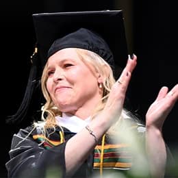 Sarah Bourque, a 2024 graduate from SNHU, speaking at Commencement after earning a bachelor's in psychology