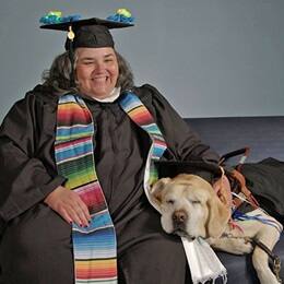 Heather Schey with their dog Asher