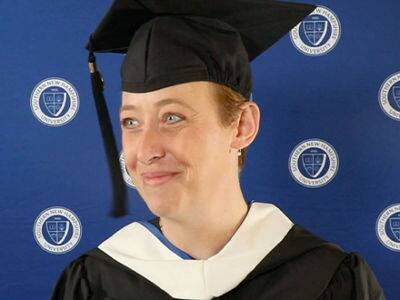 Jessica Thompson, who earned her bachelor's in human services with a concentration in substance abuse from SNHU, wearing her graduation cap and gown.