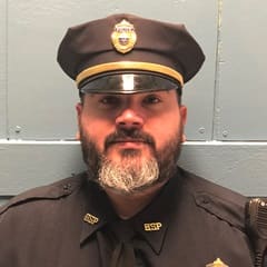 Joseph Medina, a 2017 and 2019 graduate from SNHU with associate and bachelor's degrees in criminal justice.