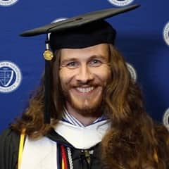 Lawrence Michael Mazza II, a 2022 graduate who earned his bachelor's degree in English and creative writing from SNHU.