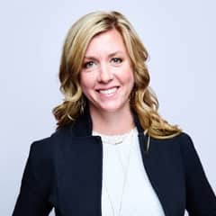 Marcy Vadurro, the associate vice president of strategic foresight at SNHU, wearing a dark blazer with a white shirt.