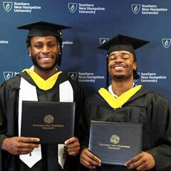 Noah Kamba '24 and Derrick Grant Jr. '24, graduates from SNHU and former men's basketball players