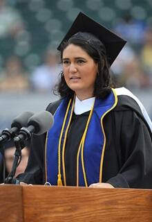 An snhu student giving a speech at commencement
