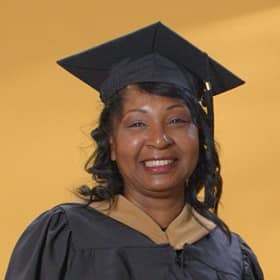 Sherita Dawkins, a 2024 graduate from SNHU with an MBA in Healthcare Management.