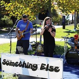 The Something Else Band, featuring SNHU Career Advisor Jason Whitney, performing at Homecoming