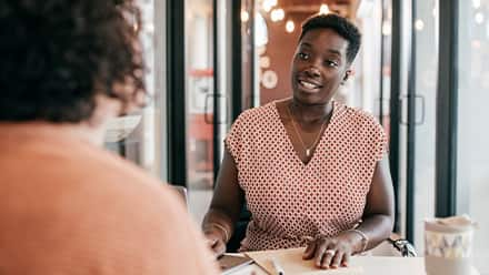 A recruiter speaking with a job candidate.