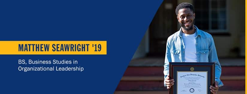 Matthew Seawright holding SNHU degree and the text Matthew Seawright '19, BS in Business Administration with a concentration in Organizational Leadership.