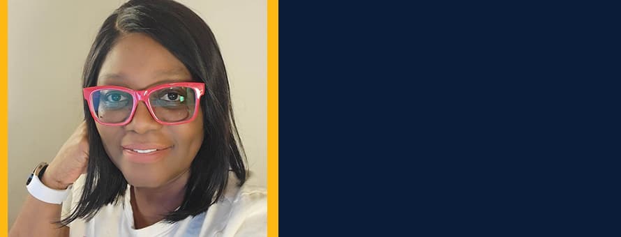 A headshot of Sallan Francis with a blue background