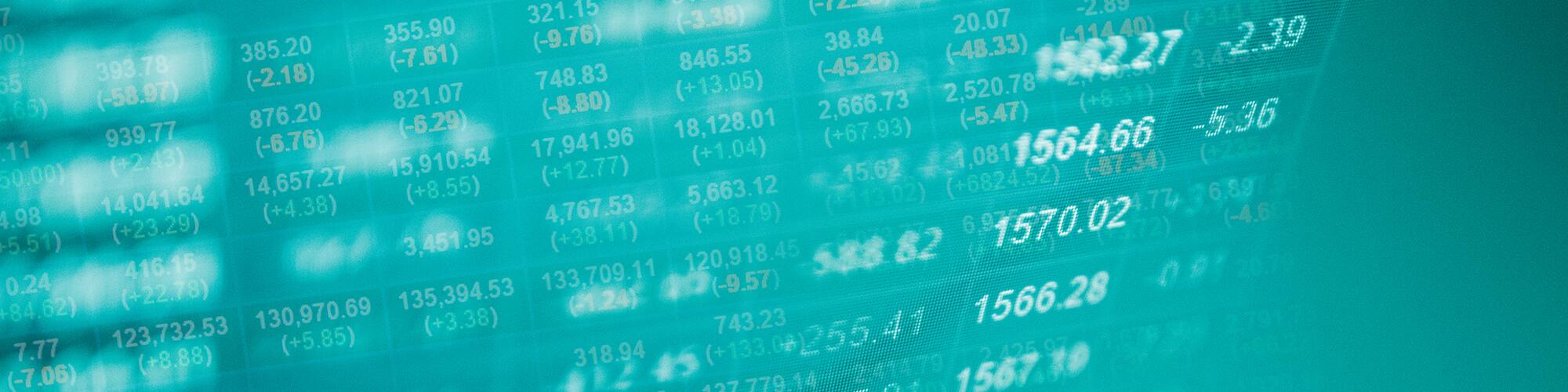 Numbers spaced out on a turquoise screen