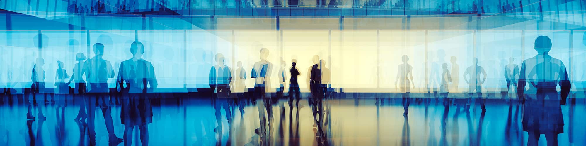 Transparent silhouettes of business professionals standing in an office setting