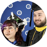 Daniel Sylvester, a Maine resident, and his sister Sarai wearing their cap and gowns at the SNHU commencement ceremony.