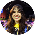 SNHU graduate and Oregon resident Katlyn Genovese wearing her cap and gown at SNHU's Commencement ceremony.