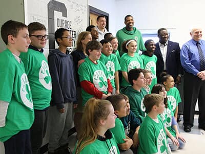 A group of students wearing Boston Celtics gear